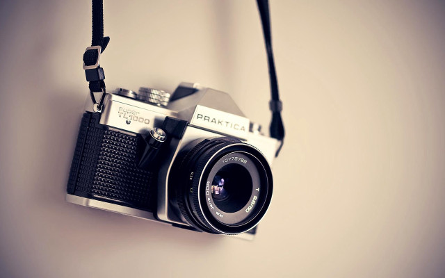 Camera hanging wall black strap #2 free wallpaper for desktop - medium preview image
