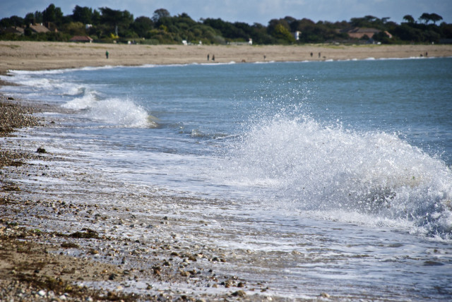 Person riding surfboard wave ocean free wallpaper for desktop - medium preview image