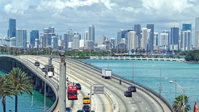 Highway traffic city tall buildings free wallpaper for desktop - medium preview image
