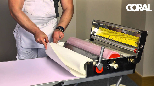 Man cutting paper machine yellow free wallpaper for desktop - medium preview image