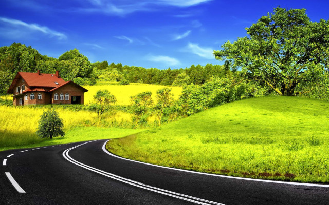 Lush green countryside road house free wallpaper for desktop - medium preview image