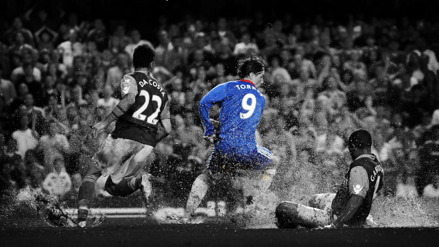 Soccer player sliding ground crowd #2 free wallpaper for desktop - medium preview image
