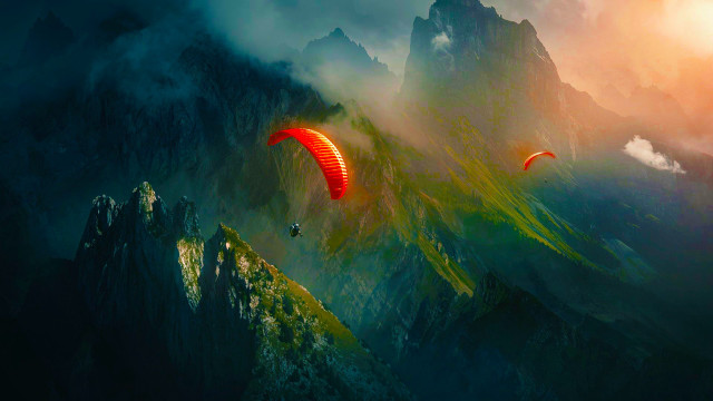 Man paragliding mountain sky parachute free wallpaper for desktop - medium preview image