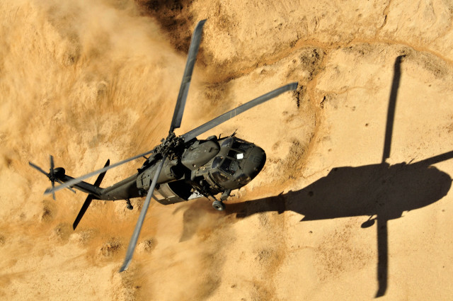 Helicopter dirt hill desert shadow free wallpaper for desktop - medium preview image