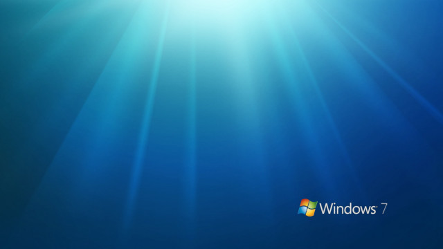 Blue background sunlight windows7 logo free wallpaper for desktop - medium preview image