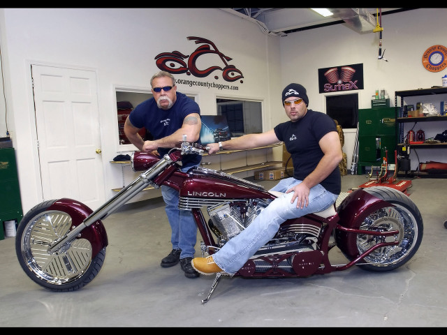 Two men motorcycle garage standing free wallpaper for desktop - medium preview image