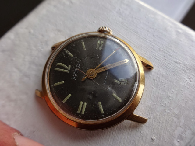 Watch white surface hand camera free wallpaper for desktop - medium preview image