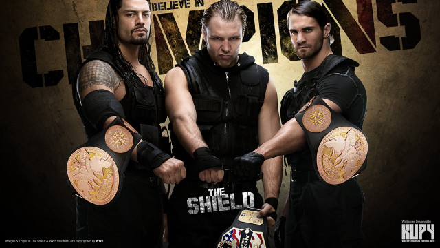 Three men black outfits holding free wallpaper for desktop - medium preview image