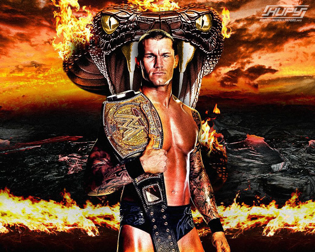 Man wrestling suit holding fire free wallpaper for desktop - medium preview image