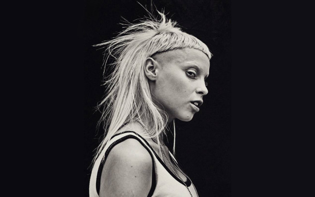 Woman ponytail earphones camera black free wallpaper for desktop - medium preview image