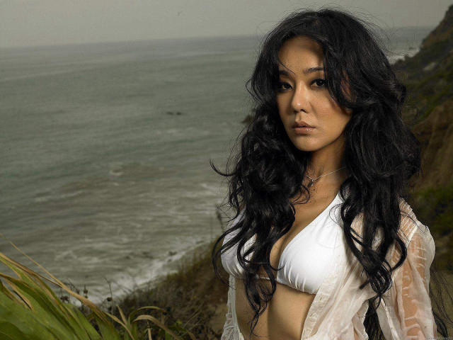 Woman white bikini cliff ocean #4 free wallpaper for desktop - medium preview image