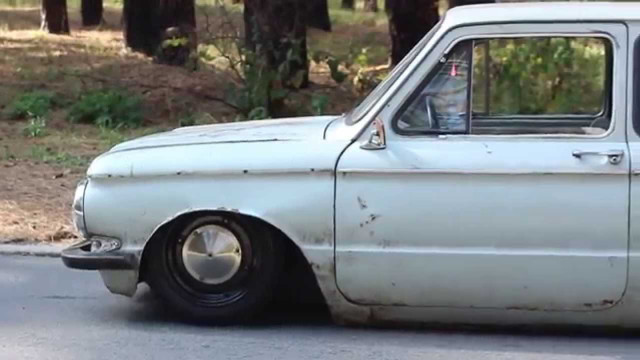 White car parked road forest #2 free wallpaper for desktop - medium preview image