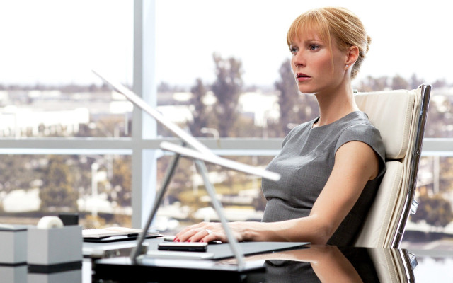 Woman sitting chair laptop desk free wallpaper for desktop - medium preview image