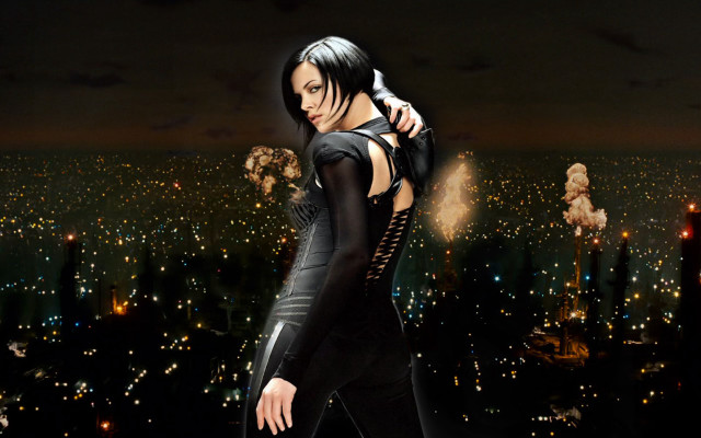 Woman black outfit cityscape night free wallpaper for desktop - medium preview image