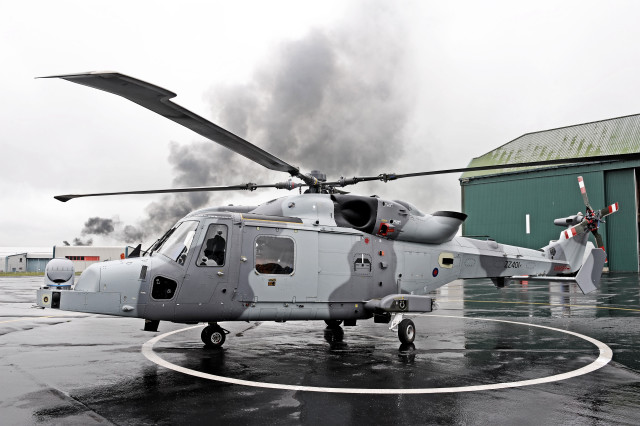 Helicopter parked wet runway smoke free wallpaper for desktop - medium preview image