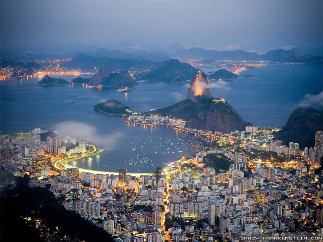 City night water mountains lit free wallpaper for desktop - medium preview image