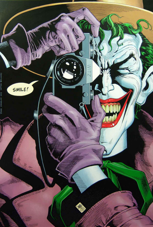 Joker holding camera pointing smiling free wallpaper for mobile - medium preview image