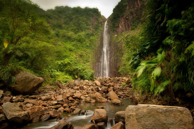 Waterfall jungle rocks trees people #2 free wallpaper for desktop - medium preview image