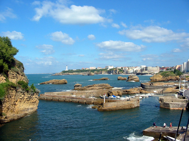 Rocky water cityscape panorama bridge free wallpaper for desktop - medium preview image