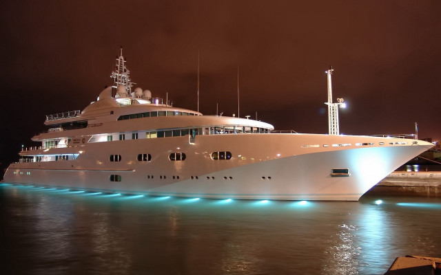Large white boat docked nighttime free wallpaper for desktop - medium preview image