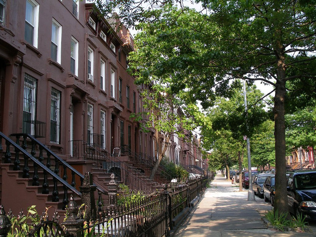 Brown houses city street cars free wallpaper for desktop - medium preview image