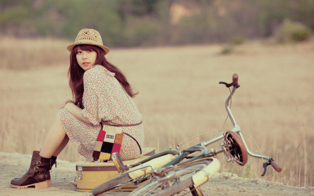 Woman sitting dirt road bike free wallpaper for desktop - medium preview image