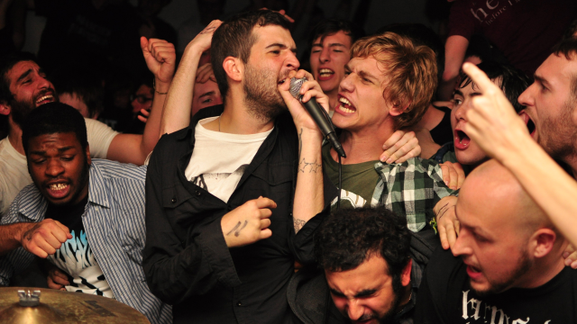 Group singing microphone crowd men free wallpaper for desktop - medium preview image