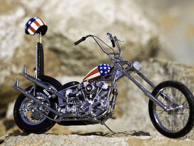 Motorcycle flag parked rock back free wallpaper for desktop - medium preview image