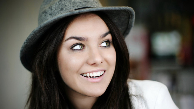 Woman hat smile face eyes free wallpaper for desktop - medium preview image