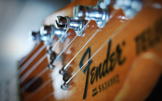 Guitar strings closeup logo name free wallpaper for desktop - medium preview image