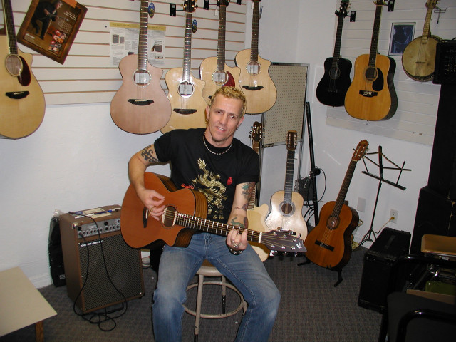 Man guitar room wall hanging free wallpaper for desktop - medium preview image