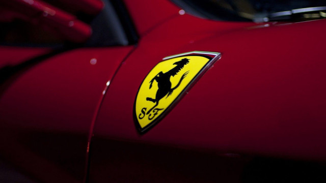Red car yellow black logo free wallpaper for desktop - medium preview image