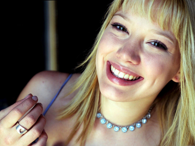 Woman necklace ring smiling camera free wallpaper for desktop - medium preview image