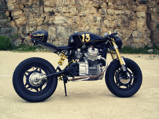 Motorcycle dirtroad rockwall grass assemblage free wallpaper for desktop - medium preview image