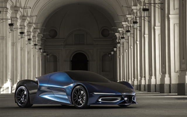 Futuristic car parked large building #4 free wallpaper for desktop - medium preview image