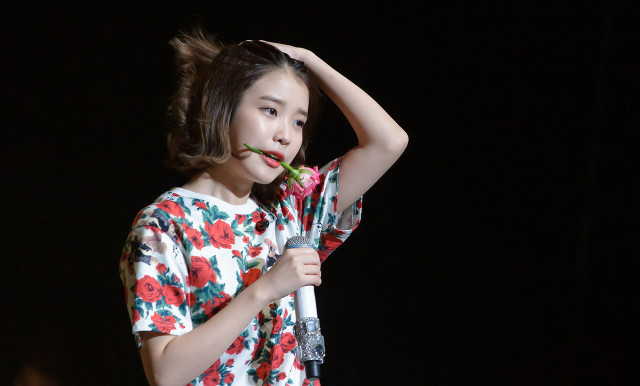 Young girl microphone flower mouth free wallpaper for desktop - medium preview image