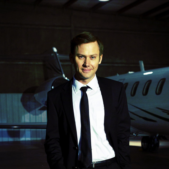 Man suit tie plane hangar free wallpaper for tablet - medium preview image