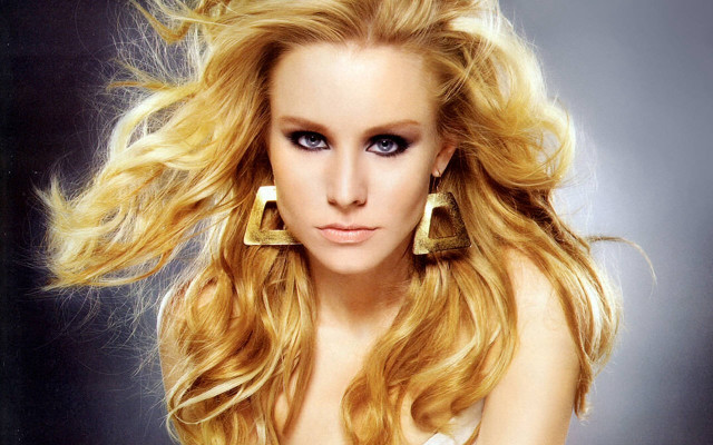 Woman blonde hair big earrings free wallpaper for desktop - medium preview image