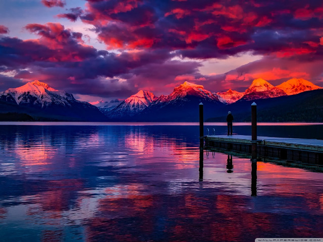 Sunset lake mountains dock person free wallpaper for desktop - medium preview image