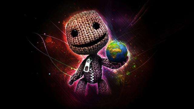 Knitted figure holding earth globe free wallpaper for desktop - medium preview image
