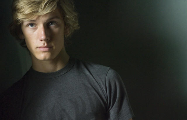 Blonde man serious look black free wallpaper for desktop - medium preview image