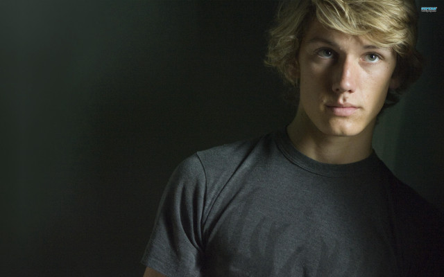 Blonde man black shirt serious #3 free wallpaper for desktop - medium preview image