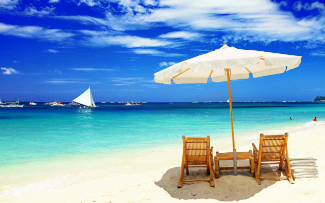 Beach chairs umbrella boats sailboat free wallpaper for desktop - medium preview image