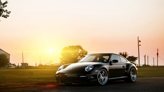 Black porsche parked road sunset free wallpaper for desktop - medium preview image