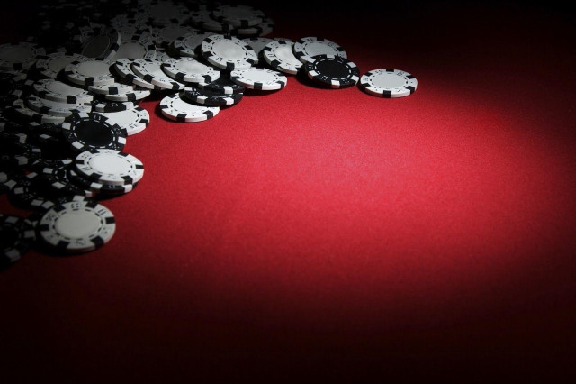 Red table poker chips background free wallpaper for desktop - medium preview image