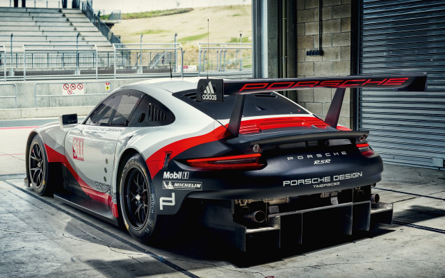 Porsche race car garage ramp free wallpaper for desktop - medium preview image