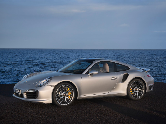 Silver sports car ocean road #2 free wallpaper for desktop - medium preview image