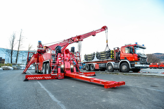 Red crane truck parking lot free wallpaper for desktop - medium preview image