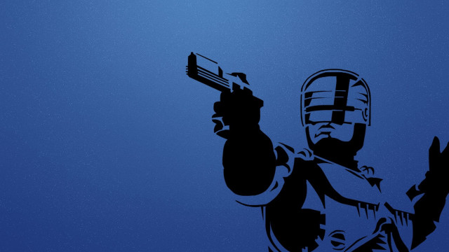 Man holding gun wearing helmet free wallpaper for desktop - medium preview image