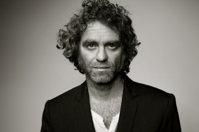 Curly hair beard suit jacket free wallpaper for desktop - medium preview image